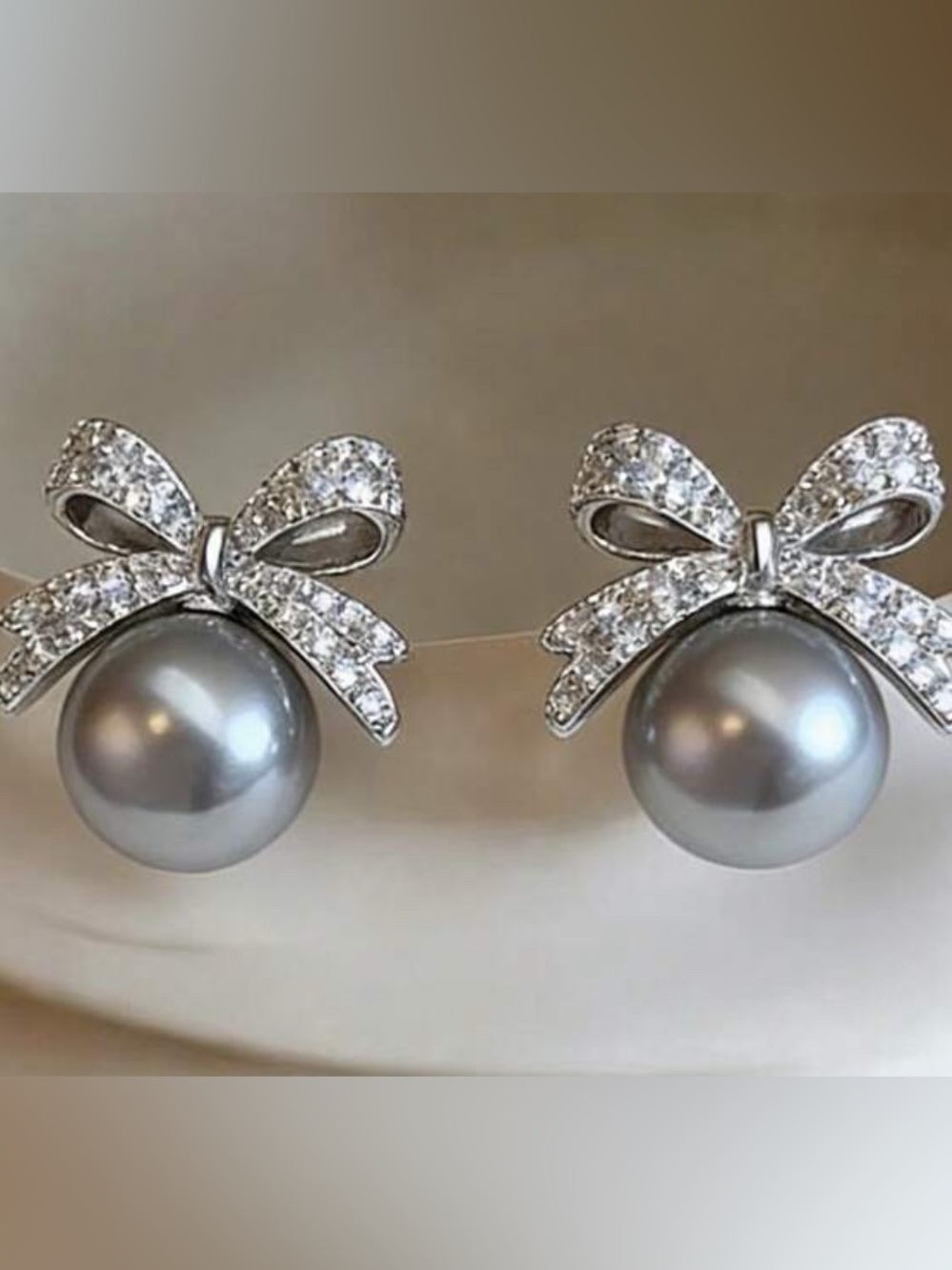 Silver Bow Faux Pearl Stud Earrings